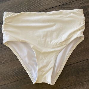 Ivory colored high-waisted bikini bottom.